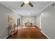 The dining room boasts hardwood floors, a modern table set, and serene backyard views at 4960 Meadow Ln, Marietta, GA 30068