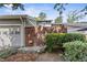 Charming exterior showcasing a private, gated entrance and well-maintained landscaping at 4960 Meadow Ln, Marietta, GA 30068