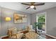 Bright sitting room featuring a ceiling fan, window and natural light, plus stylish furnishings at 4960 Meadow Ln, Marietta, GA 30068