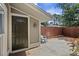 Front patio with green door, chair, and partial fence at 4960 Meadow Ln, Marietta, GA 30068