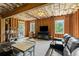 Partially finished basement with leather sectional and door to backyard at 638 Glen Valley Way, Dacula, GA 30019