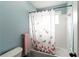 Bathroom featuring a butterfly-themed shower curtain and accessories at 638 Glen Valley Way, Dacula, GA 30019