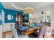 Dining room featuring hardwood floors, a modern chandelier, and seating for six at 638 Glen Valley Way, Dacula, GA 30019