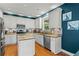 Kitchen with stainless steel appliances, granite countertops, tile backsplash and white cabinets at 638 Glen Valley Way, Dacula, GA 30019