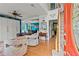 Inviting living area featuring hardwood floors, natural light, and an open layout connecting to the dining room at 638 Glen Valley Way, Dacula, GA 30019