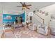 Inviting living area featuring hardwood floors, natural light, and an open layout connecting to the dining room at 638 Glen Valley Way, Dacula, GA 30019