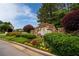 Stone monument sign for The Terraces at Appalachian Farms surrounded by landscaped flower beds at 638 Glen Valley Way, Dacula, GA 30019