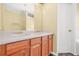 Bathroom with double sink vanity and large mirror at 6799 Hill Creek Cv, Lithonia, GA 30058