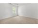 Bedroom featuring carpet and natural light at 6799 Hill Creek Cv, Lithonia, GA 30058