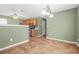 Open-concept dining area that is adjacent to the kitchen, featuring stylish tile flooring at 6799 Hill Creek Cv, Lithonia, GA 30058