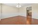 Elegant dining room with hardwood floors and modern wainscoting, perfect for Gathering meals and entertaining guests at 6799 Hill Creek Cv, Lithonia, GA 30058