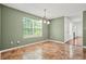 Cozy dining room with tile floors, a bright window, and a view into another room, perfect for gatherings at 6799 Hill Creek Cv, Lithonia, GA 30058