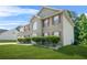 Beautiful two-story home with brick facade, red shutters, and manicured landscaping at 6799 Hill Creek Cv, Lithonia, GA 30058