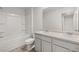 Bathroom features a double vanity, and a bathtub and shower combination at 1400 Gray Branch Dr, Lawrenceville, GA 30045