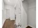 Bright hallway featuring a view of the bathroom and walk-in closet at 1400 Gray Branch Dr, Lawrenceville, GA 30045
