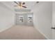 Spacious bedroom with tray ceiling and neutral carpeting for a relaxing atmosphere at 1400 Gray Branch Dr, Lawrenceville, GA 30045