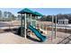 Community playground with slide and climbing structures at 1400 Gray Branch Dr, Lawrenceville, GA 30045