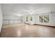 A spacious basement features natural light, neutral colors, and room for recreation or storage at 194 Lake Ruby Dr, Suwanee, GA 30024
