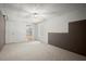 The partially finished basement includes lighting, and space for customization and storage at 194 Lake Ruby Dr, Suwanee, GA 30024