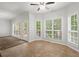 Breakfast nook with views of backyard deck through multiple windows at 194 Lake Ruby Dr, Suwanee, GA 30024