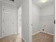 A spacious closet with shelves and a door offers plenty of storage and organization options at 194 Lake Ruby Dr, Suwanee, GA 30024