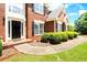 Close up of the front entrance of the property showcasing a brick walkway and foundation at 194 Lake Ruby Dr, Suwanee, GA 30024