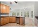 Kitchen with granite countertops, stainless steel appliances, tile flooring and a breakfast nook at 194 Lake Ruby Dr, Suwanee, GA 30024