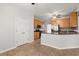 Kitchen features granite countertops, stainless appliances and lots of natural light at 194 Lake Ruby Dr, Suwanee, GA 30024