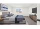 Cozy bedroom with a large window and contemporary decor, creating a peaceful retreat at 382 Northdale Ct, Lawrenceville, GA 30046
