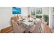 Elegant dining room with modern table setting and sliding glass doors to outdoors at 382 Northdale Ct, Lawrenceville, GA 30046