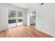 Bright room featuring wood flooring and a sliding door to a patio at 382 Northdale Ct, Lawrenceville, GA 30046