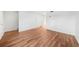 Spacious living area featuring wood floors and neutral walls, ready for personalization at 382 Northdale Ct, Lawrenceville, GA 30046