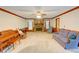 Comfortable living room featuring a stone fireplace, and ample seating at 402 Princeton Way, Lawrenceville, GA 30044