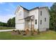Beautiful two-story home with light siding, a two-car garage, and a well-manicured front yard at 4095 Oriole Ln, Fairburn, GA 30213