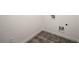 Laundry room featuring tile flooring, white walls, and washer and dryer hookups at 4095 Oriole Ln, Fairburn, GA 30213