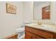 This bathroom has a light colored vanity and beige walls at 574 Hickory Hills Ct, Stone Mountain, GA 30083