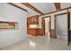 View of living room from hallway with hard floors and an open floor plan at 574 Hickory Hills Ct, Stone Mountain, GA 30083