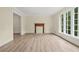 Bright living room has lots of natural light, and a decorative fireplace at 574 Hickory Hills Ct, Stone Mountain, GA 30083
