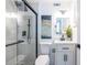 Modern bathroom features a sleek glass shower and contemporary white vanity at 115 Biscayne Nw Dr # F10, Atlanta, GA 30309