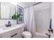 Bathroom featuring subway tile, framed art, and modern fixtures at 115 Biscayne Nw Dr # F10, Atlanta, GA 30309