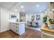 Open concept dining area features wood floors, a modern table, and neutral decor at 115 Biscayne Nw Dr # F10, Atlanta, GA 30309