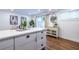Bright open floor plan of an eat-in kitchen featuring an island and modern decor at 115 Biscayne Nw Dr # F10, Atlanta, GA 30309