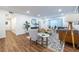 Bright living room featuring hardwood floors, stylish decor, modern furniture, and lots of natural light at 115 Biscayne Nw Dr # F10, Atlanta, GA 30309