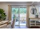 Cozy patio with neutral decor, outdoor seating, and sliding glass doors for an indoor/outdoor living at 115 Biscayne Nw Dr # F10, Atlanta, GA 30309