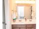 Modern bathroom featuring a double vanity with stylish fixtures at 2159 Holland Creek Ln, Buford, GA 30519