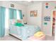 Cozy bedroom with a bed and blue accents at 2159 Holland Creek Ln, Buford, GA 30519