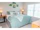 Comfortable bedroom with bright natural light and tasteful decor at 2159 Holland Creek Ln, Buford, GA 30519