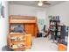 Interesting bedroom space with a loft bed and music area at 2159 Holland Creek Ln, Buford, GA 30519