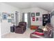 Upstairs bonus room featuring comfortable seating and unique decor at 2159 Holland Creek Ln, Buford, GA 30519