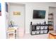 Bonus room featuring a work space and entertainment center with wall-mounted TV at 2159 Holland Creek Ln, Buford, GA 30519